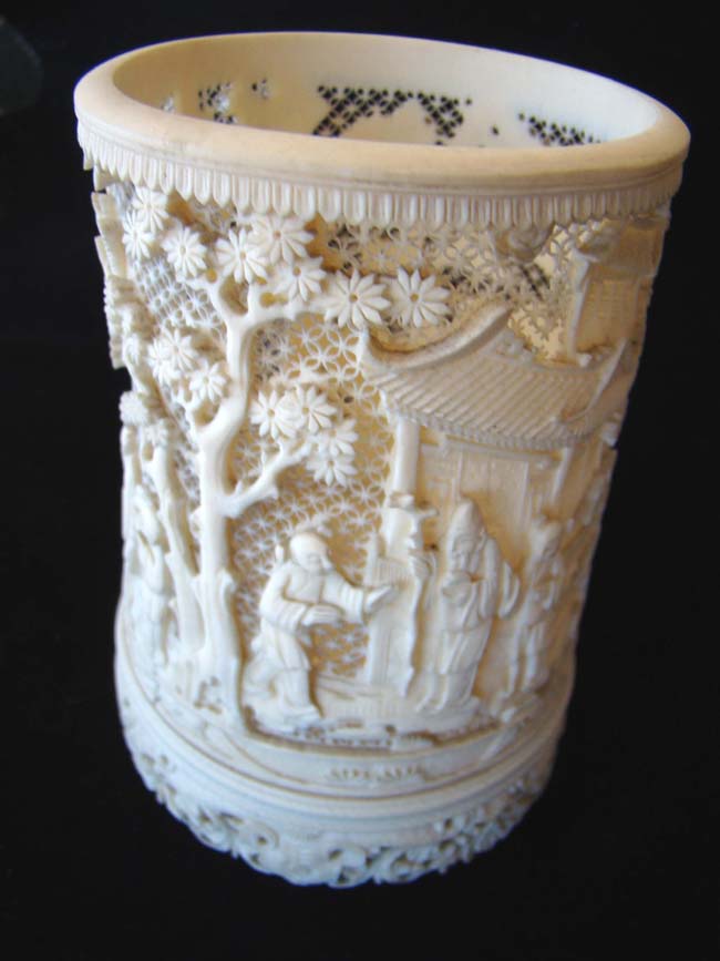 An amazing 19th century Chinese carved elephant ivory cup.